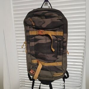 Dakine Camouflage Backpack with Yellow and Brown Accents